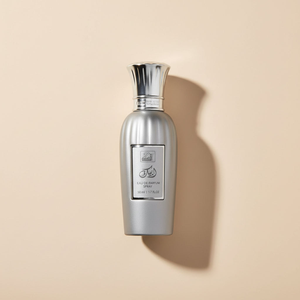 Silver perfume bottle with a white background