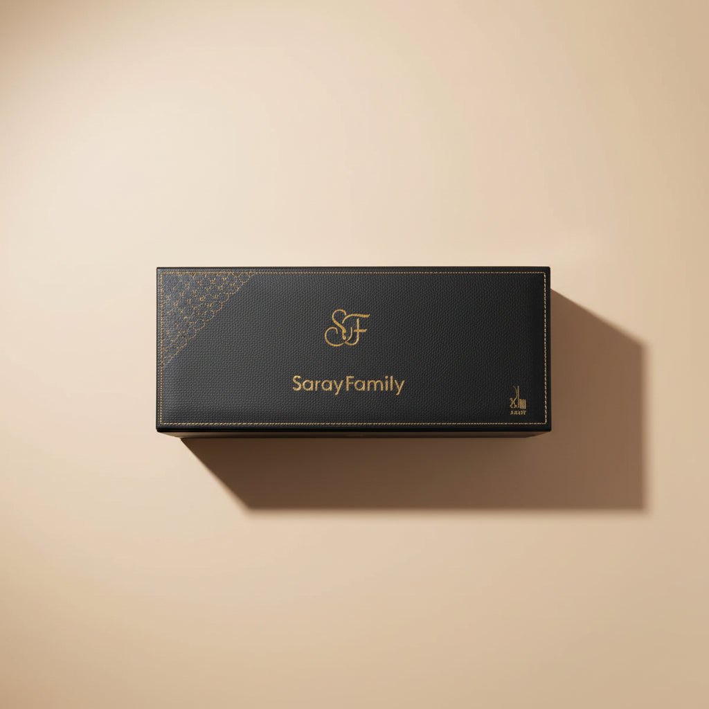 Set of perfume bottles in a high-end box with visible brand logo on a dark background