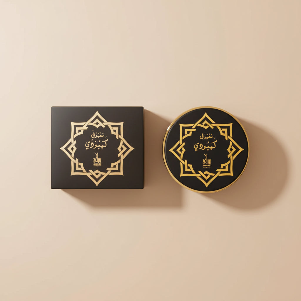Black container with gold decorative design and text on a white background