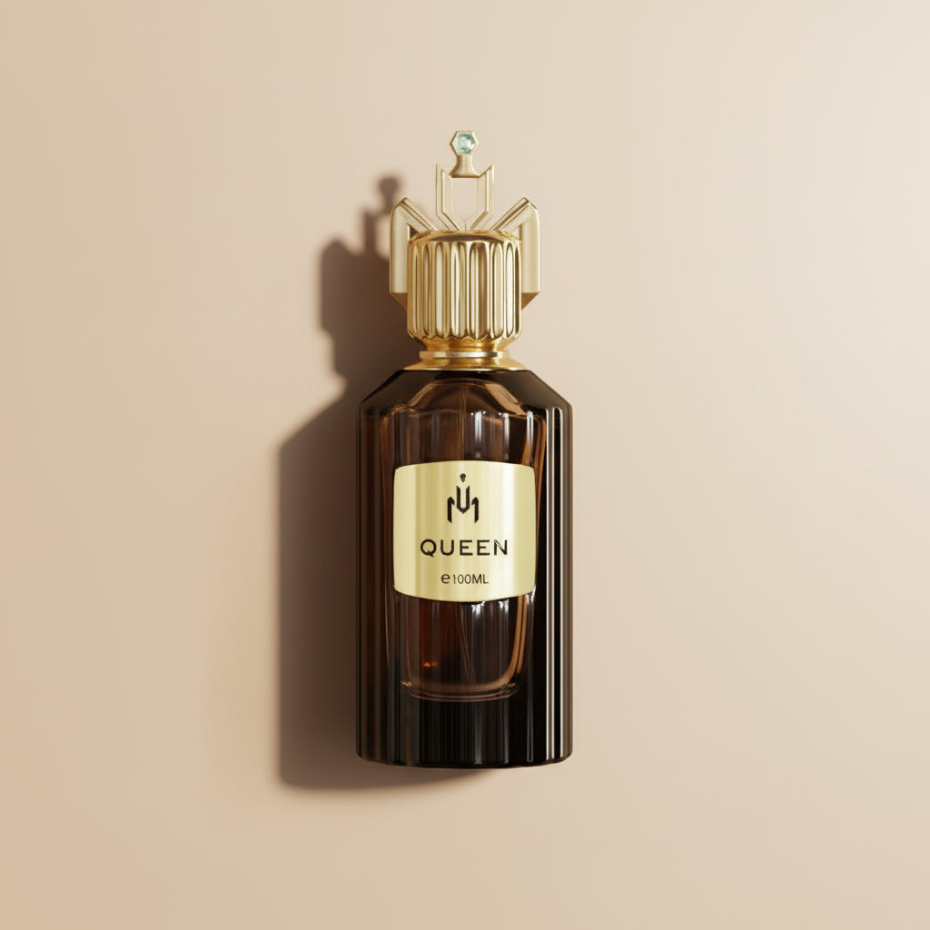 Perfume bottle with gold cap and 'QUEEN' label on a white background