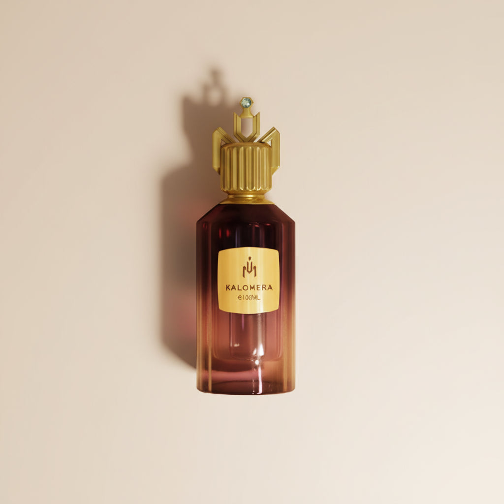 Perfume bottle with gold cap and 'Kalomera' label on a white background
