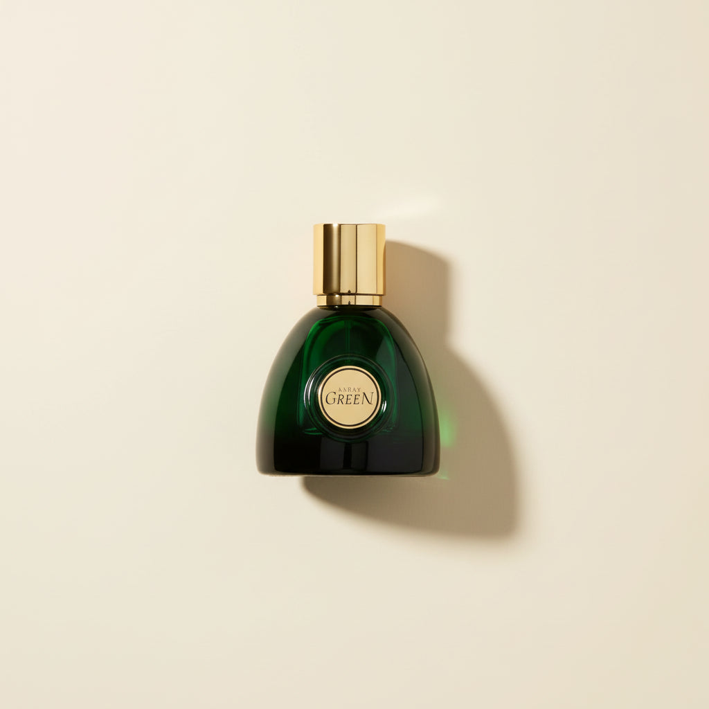 Green perfume bottle with gold cap on a white background
