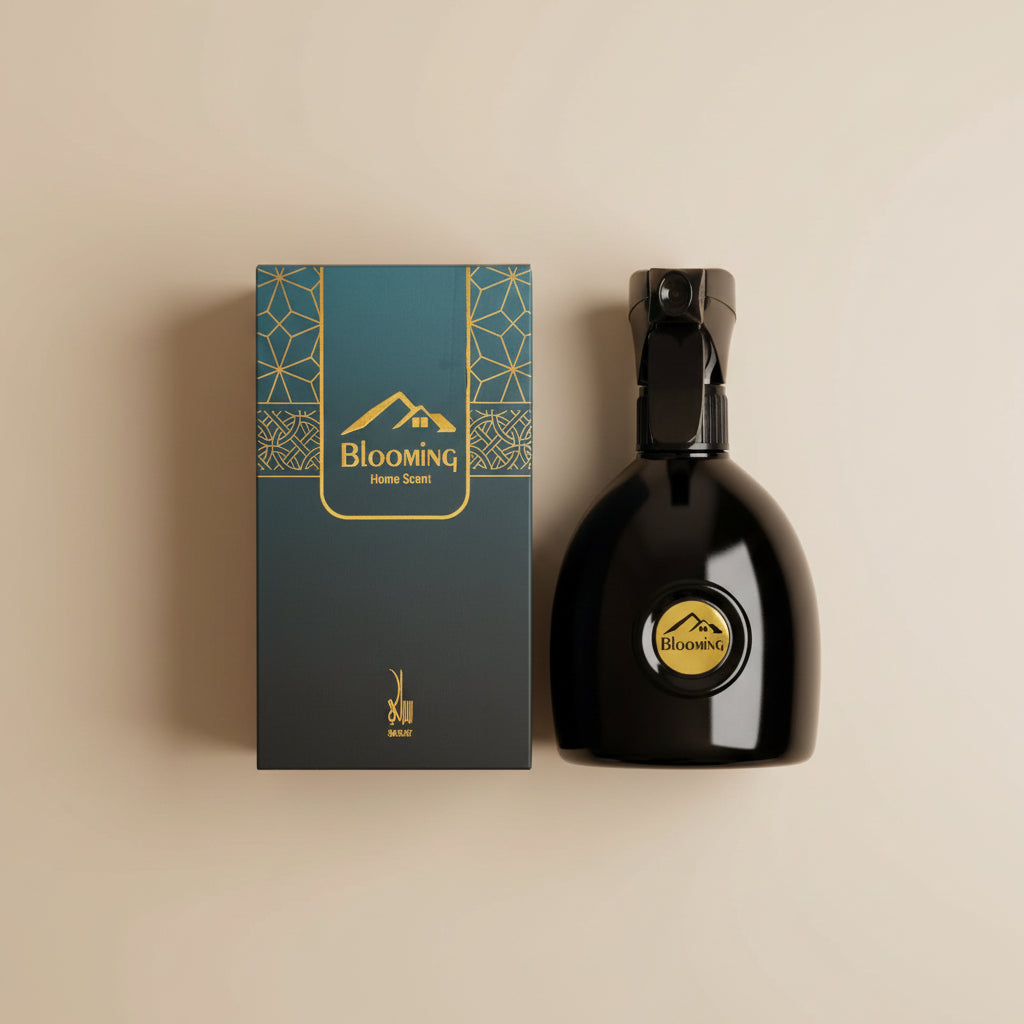 Black spray bottle with 'Blooming' logo next to its packaging on a white background