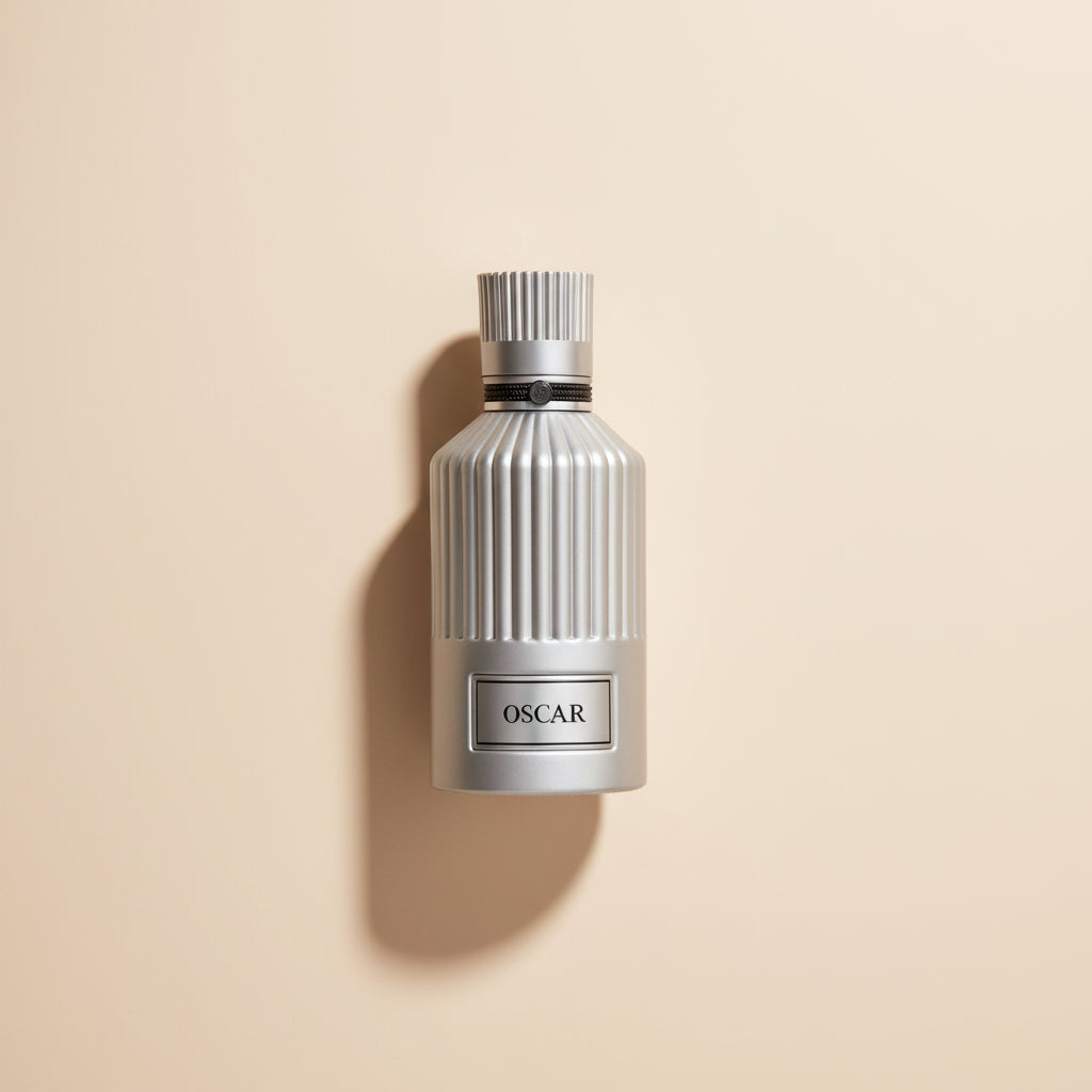 Silver perfume bottle labeled 'OSCAR' on a white background