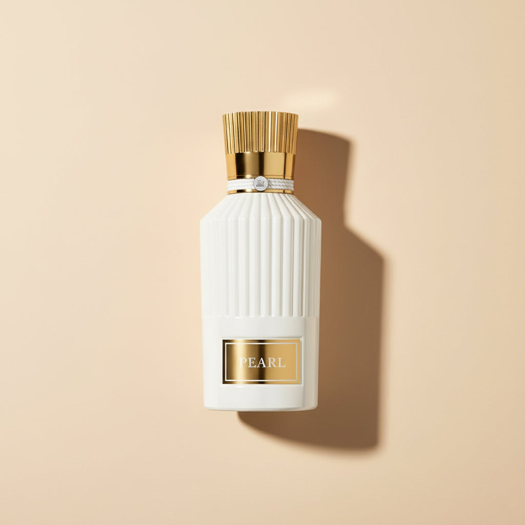 Perfume bottle labeled 'Pearl' with a gold cap on a white background
