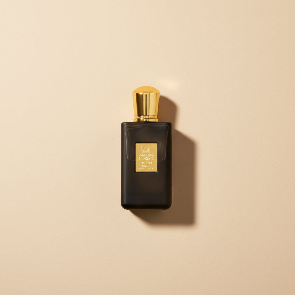 Perfume bottle with gold cap and label on a white background