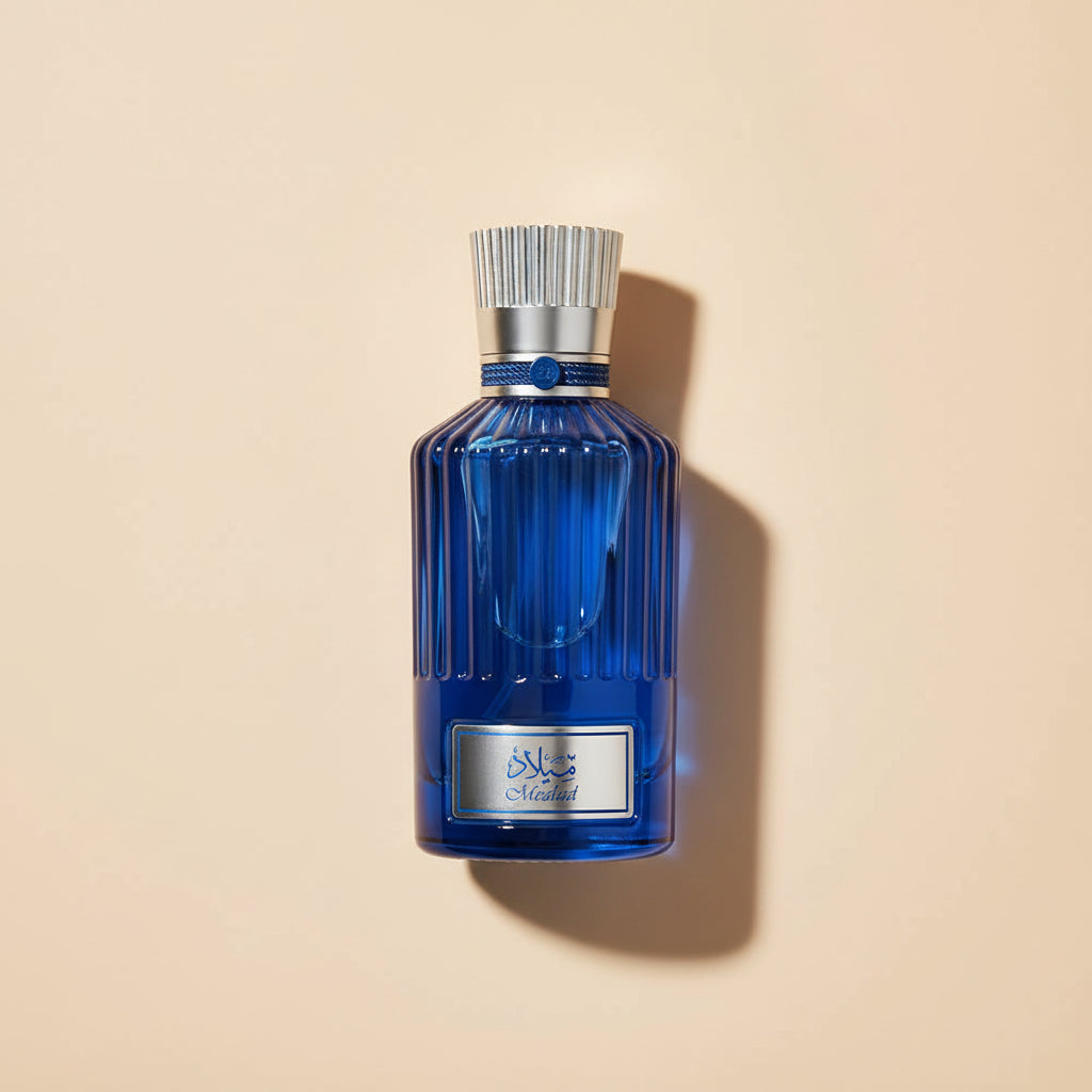 Blue perfume bottle with a white cap on a white background